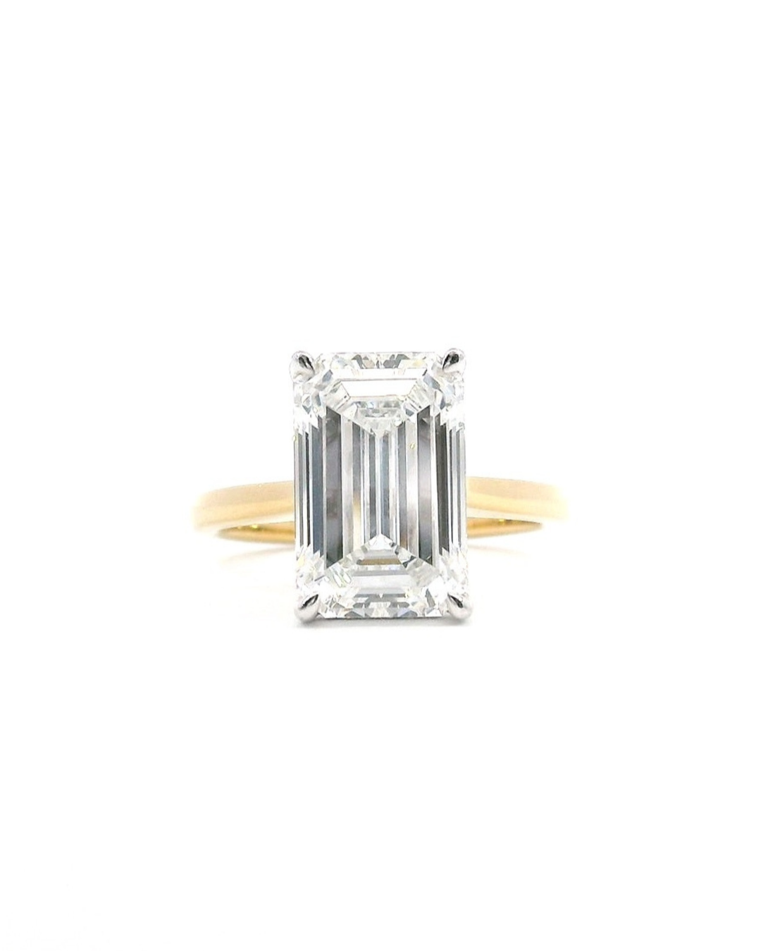Emerald Cut Diamond in the Parker Classic Solitaire with Hidden Halo
