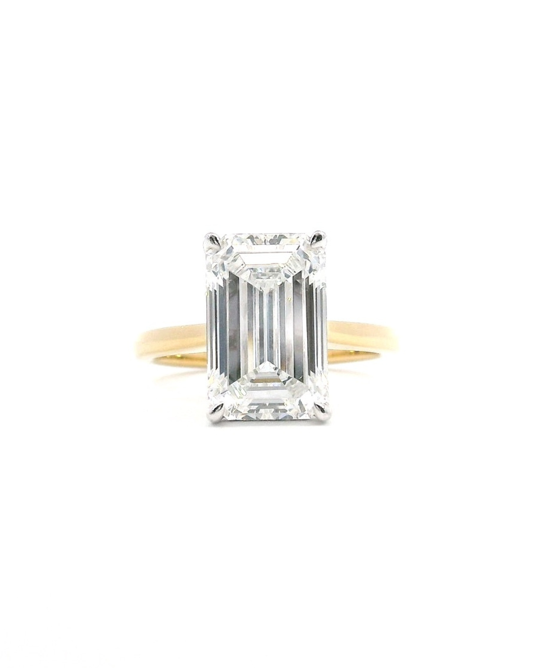 Emerald Cut Diamond in the Parker Classic Solitaire with Hidden Halo