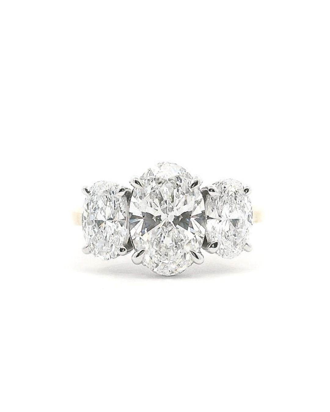 Oval Cut Diamond with Oval Sides in the Trilogy Design with Hidden Halo
