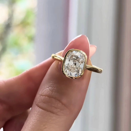 Elongated Cushion Old Mine Diamond Bezel Set Engagement Ring