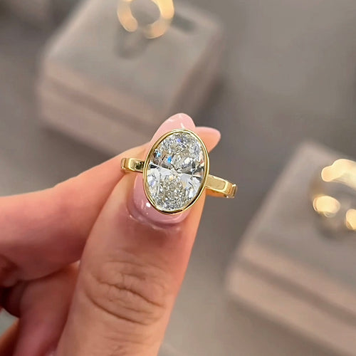 Oval Cut Diamond Bezel Set Engagement Ring