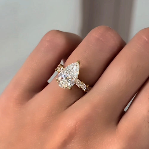 Pear Cut Diamond with Marquise Sides Engagement Ring