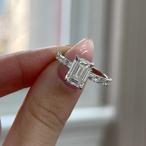 Emerald Cut Diamond Centre with Round Brilliant and Baguette Sides Engagement Ring