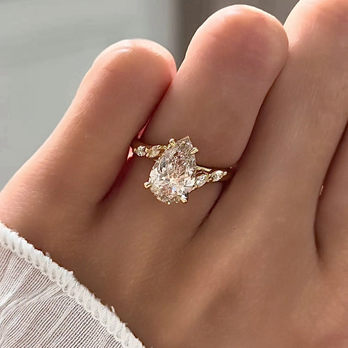 Pear Cut Pink Diamond Swirl Cathedral with Marquise Sides Engagement Ring