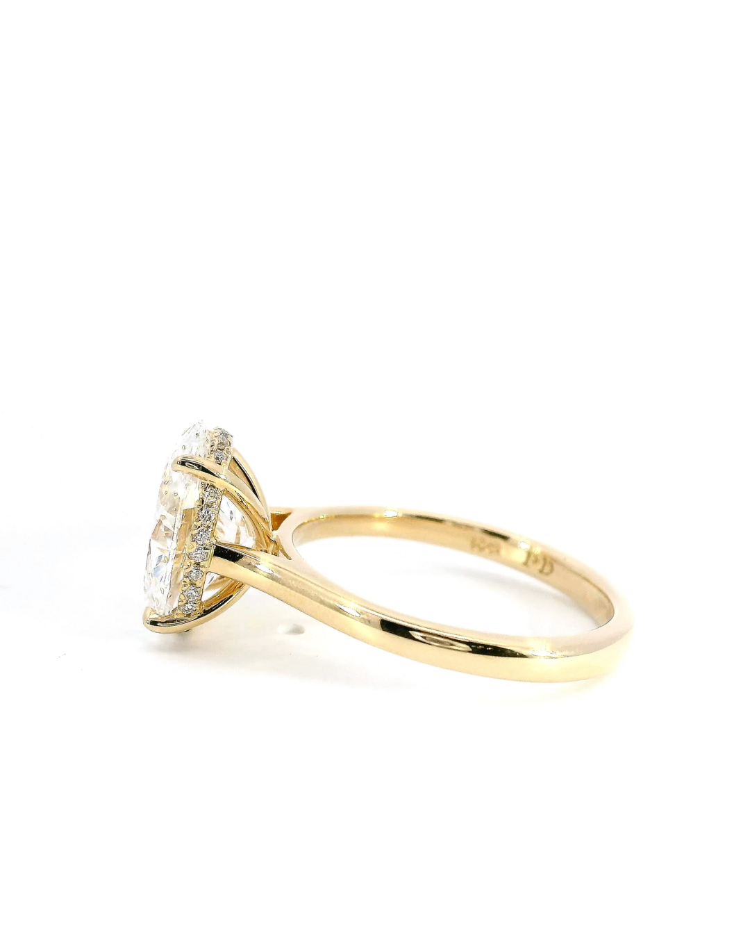 Oval Cut Diamond in the Cathedral Solitaire with Hidden Halo