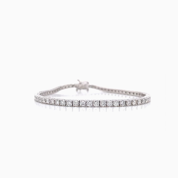 Sold at Auction: 2.00ct Diamond 18ct White Gold Tennis Bracelet. Forty Nine  Round Brilliant Cut Diamonds. Comes With Certificate of Valuation of  $8,590. Bracelet Measures 18.4cm x 3mm. Free Express Delivery With